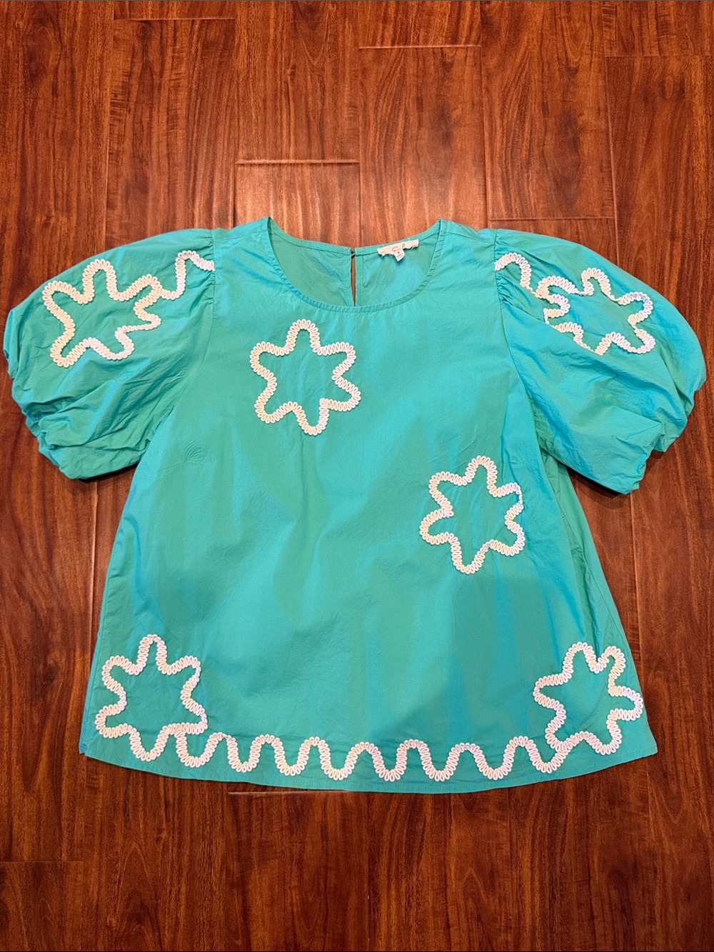 Turquoise Puff Sleeve Top with White Crochet Floral Trim